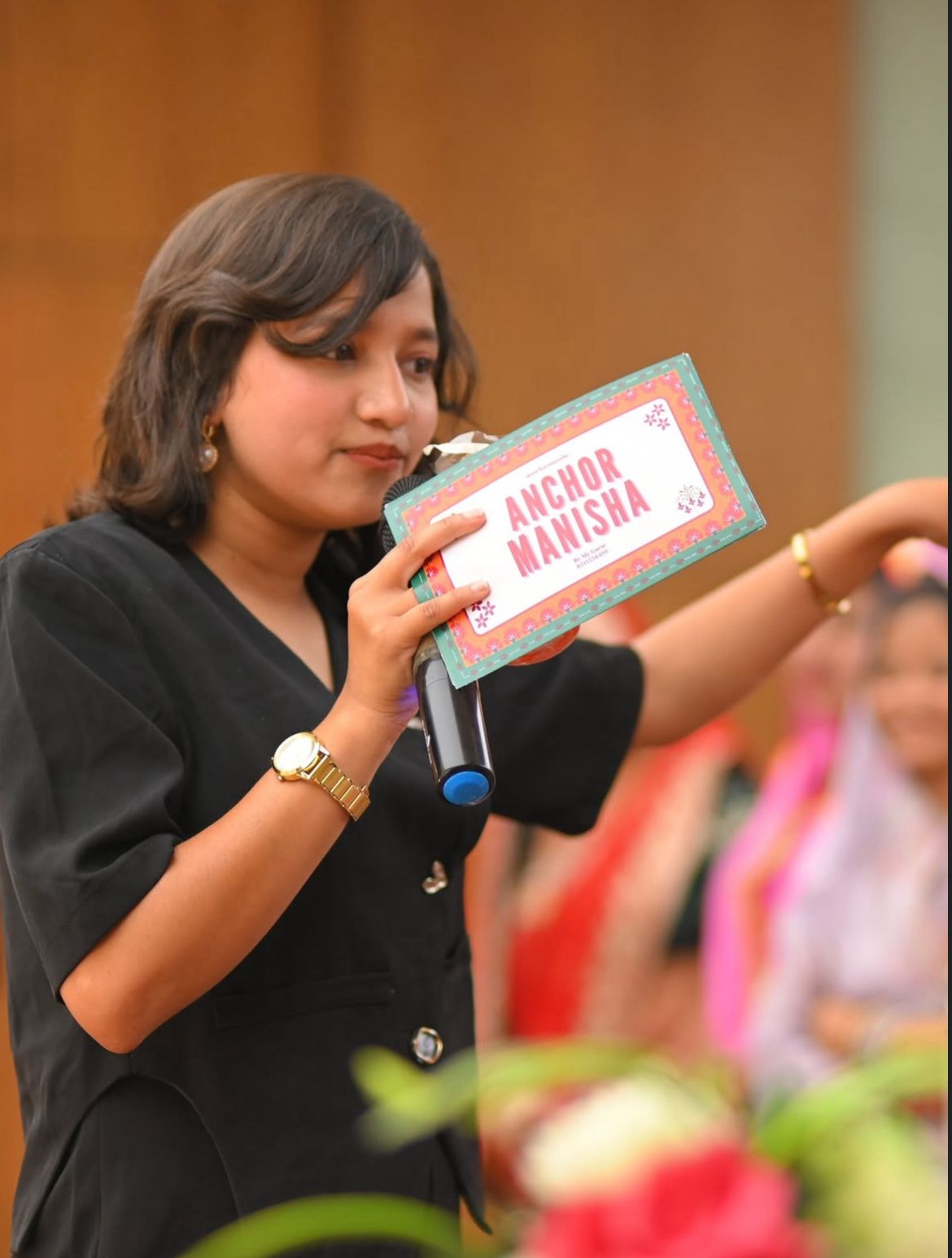 Anchor Manisha hosting a Corporate Gala event